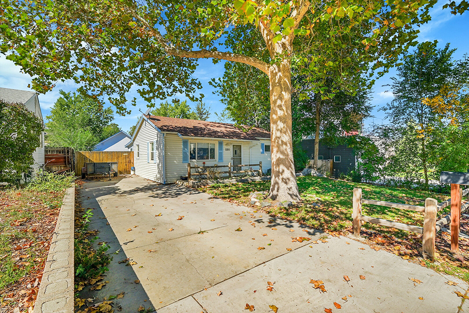 Front at 5261 North Raleigh Street, Denver, CO 80212, listed by Chris Greenburg