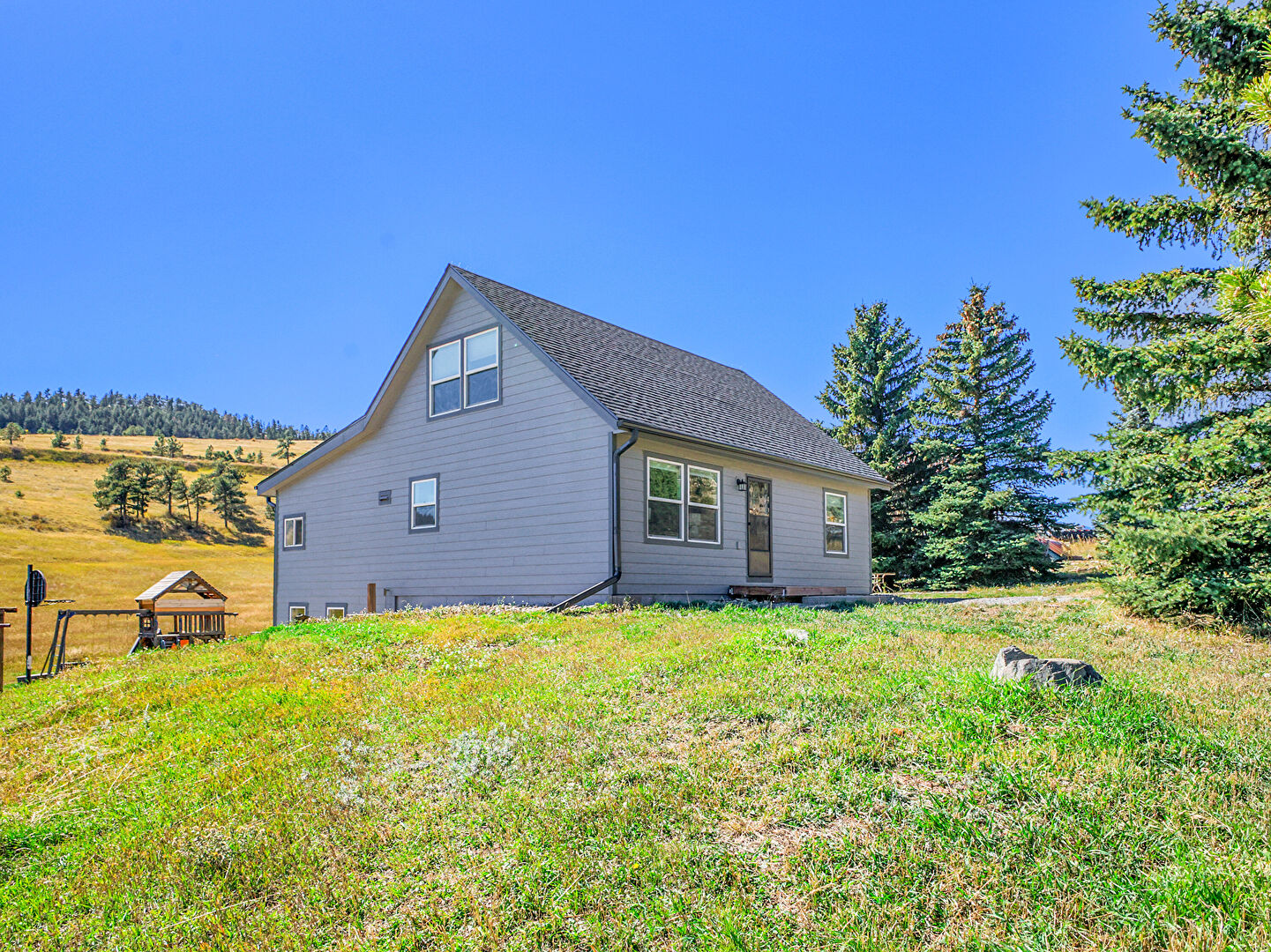 Property Exterior at 3944 Douglas Mountain Drive, Golden, CO 80403, listed by Jodi Dolph