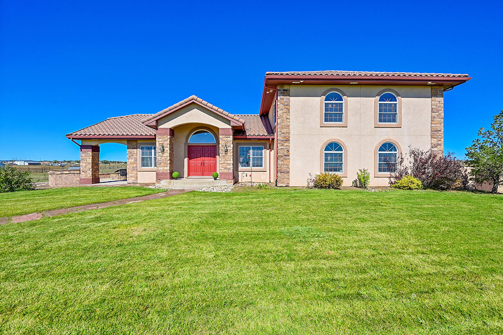 Front at 19530 Cheryl Grove, Peyton, CO 80831, listed by Kathy Eaton