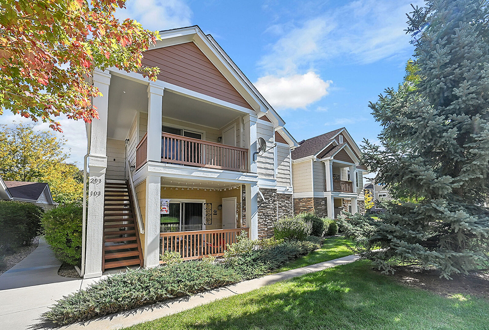 Front at 4605 Hahns Peak Drive #203, Loveland, CO 80538, listed by Valerie Skorka Westmark