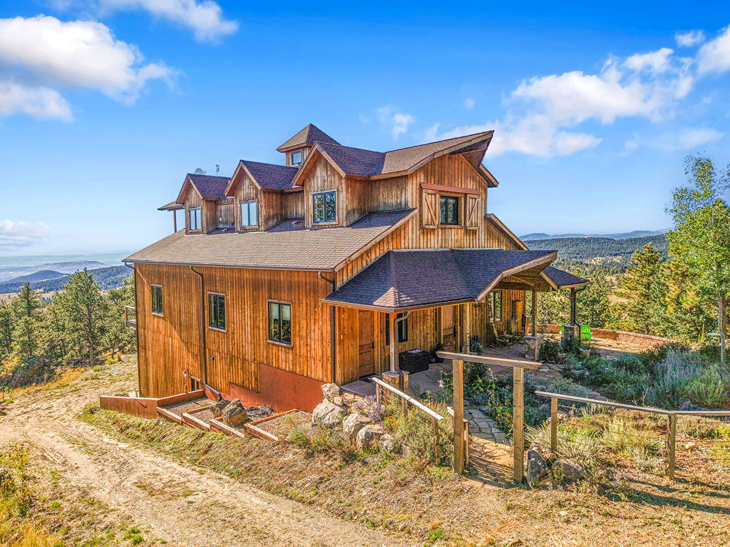 Front at 27659 Misty Road, Golden, CO 80403, listed by Pandora & John Erlandson