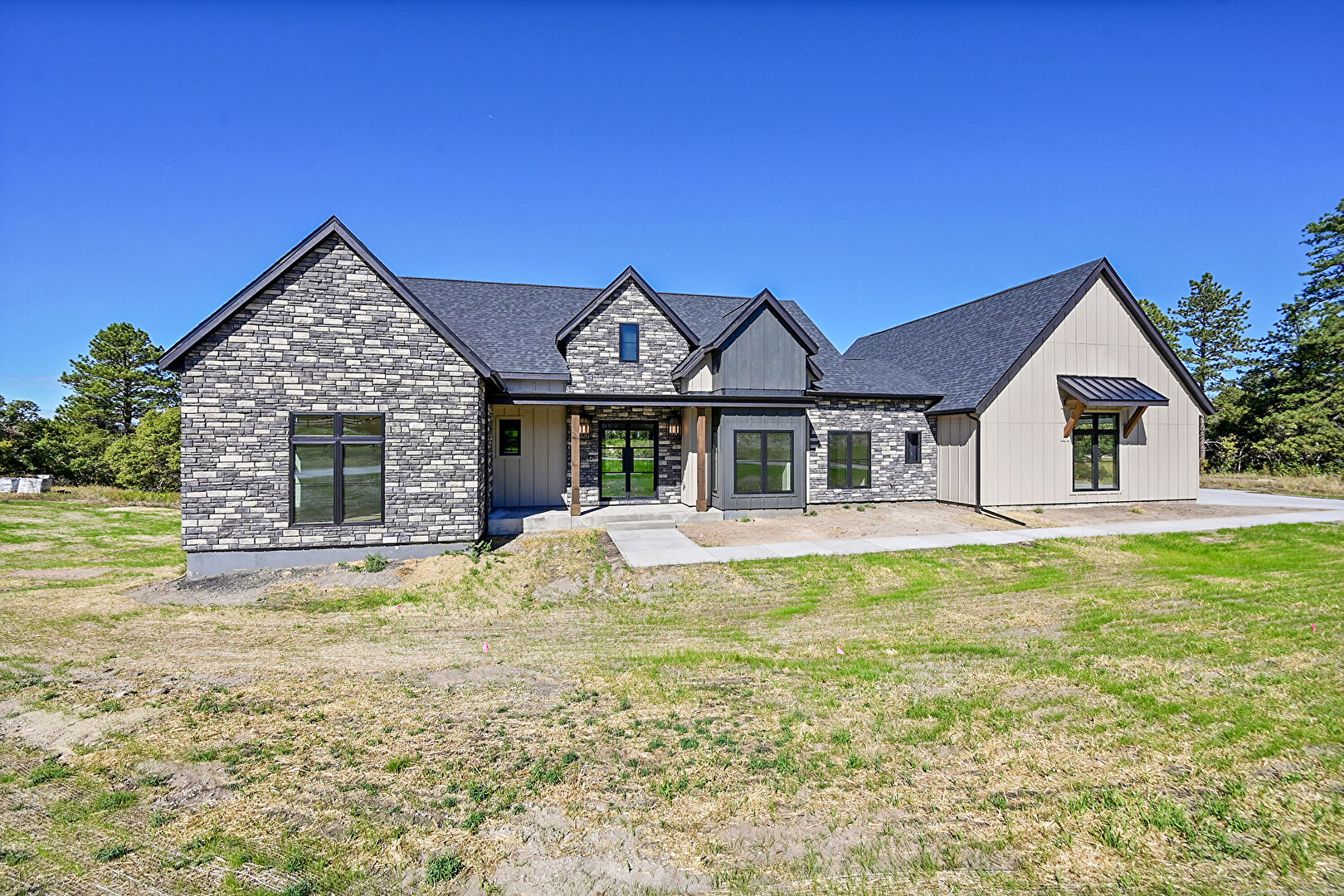 Front at 1564  Arrowpoint Court, Franktown, CO 80116, listed by Megan Gage