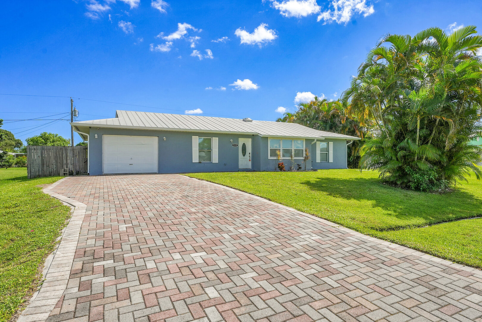 Front at 709 Southwest Dorchester Street, Port St. Lucie, FL 34983, listed by Keith Weiner