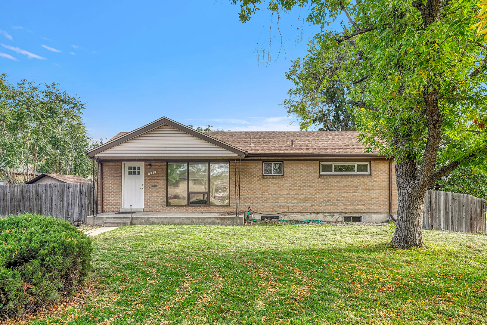 Front at 980 West 72nd Avenue, Denver, CO 80221, listed by Taylor Haas