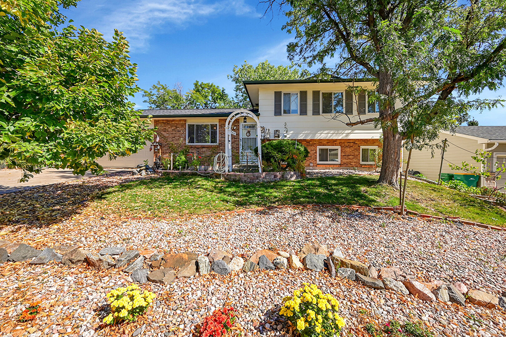 Front at 1750 South Norfolk Street, Aurora, CO 80017, listed by Mike & Ed Hardey