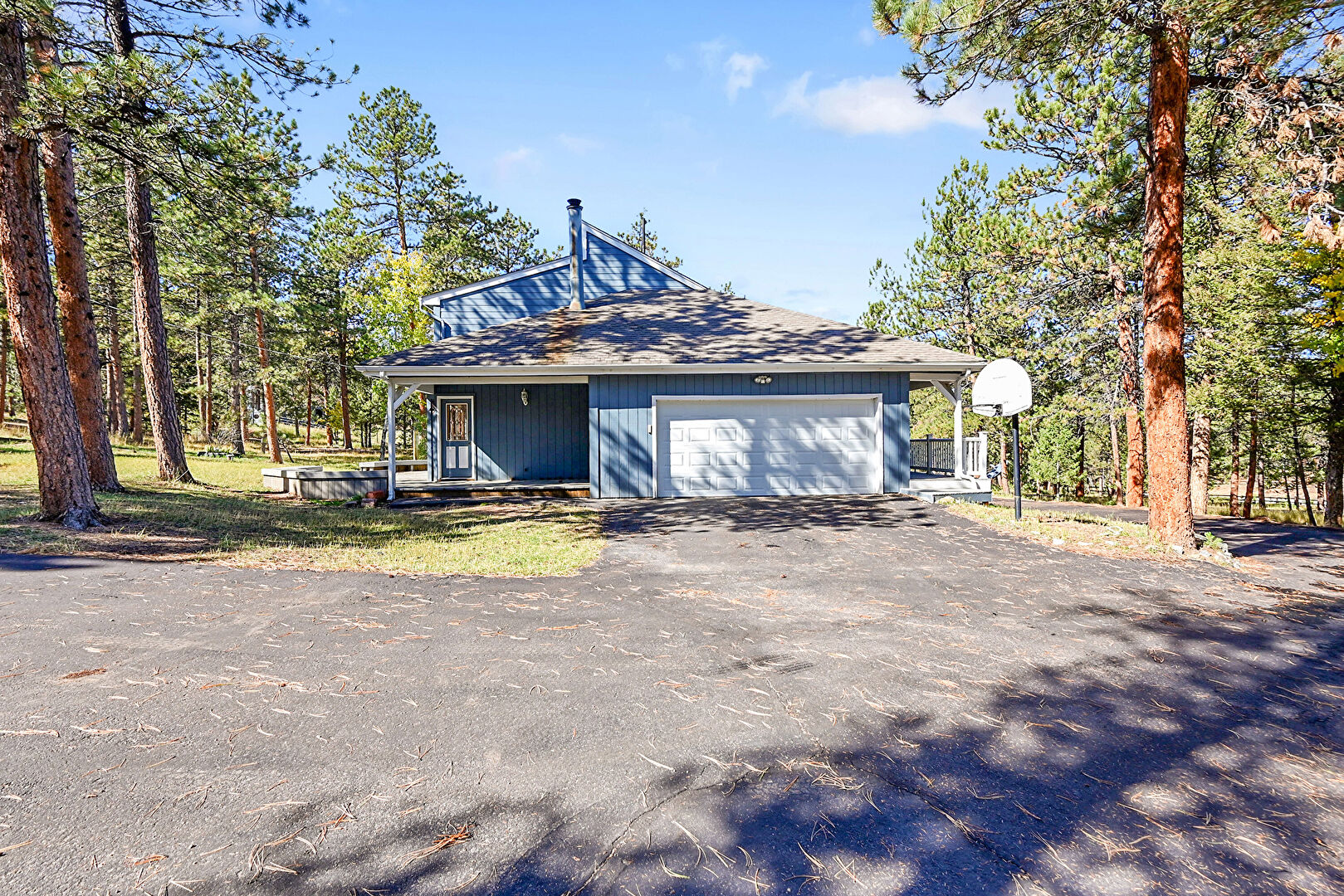 Front at 348 Nova Road, Pine, CO 80470, listed by Greg Whisler