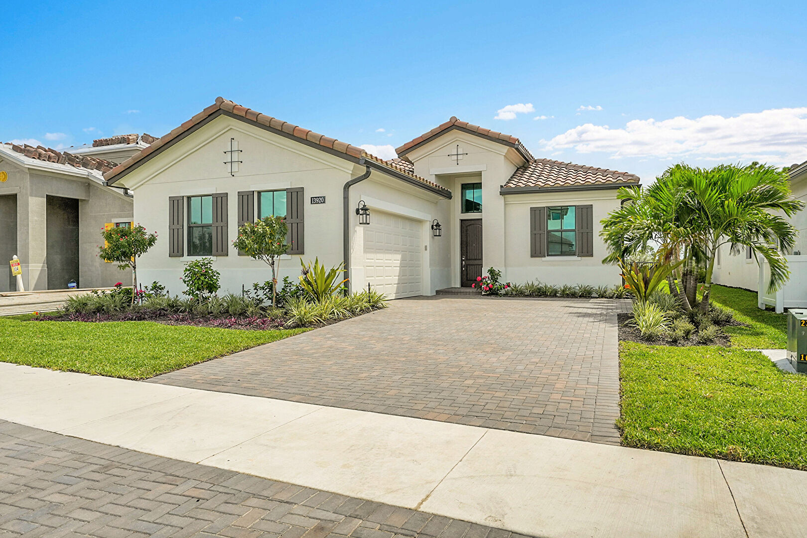 Front at 13920 Vivant Drive, Palm Beach Gardens, FL 33412, listed by Ravi Mohanka