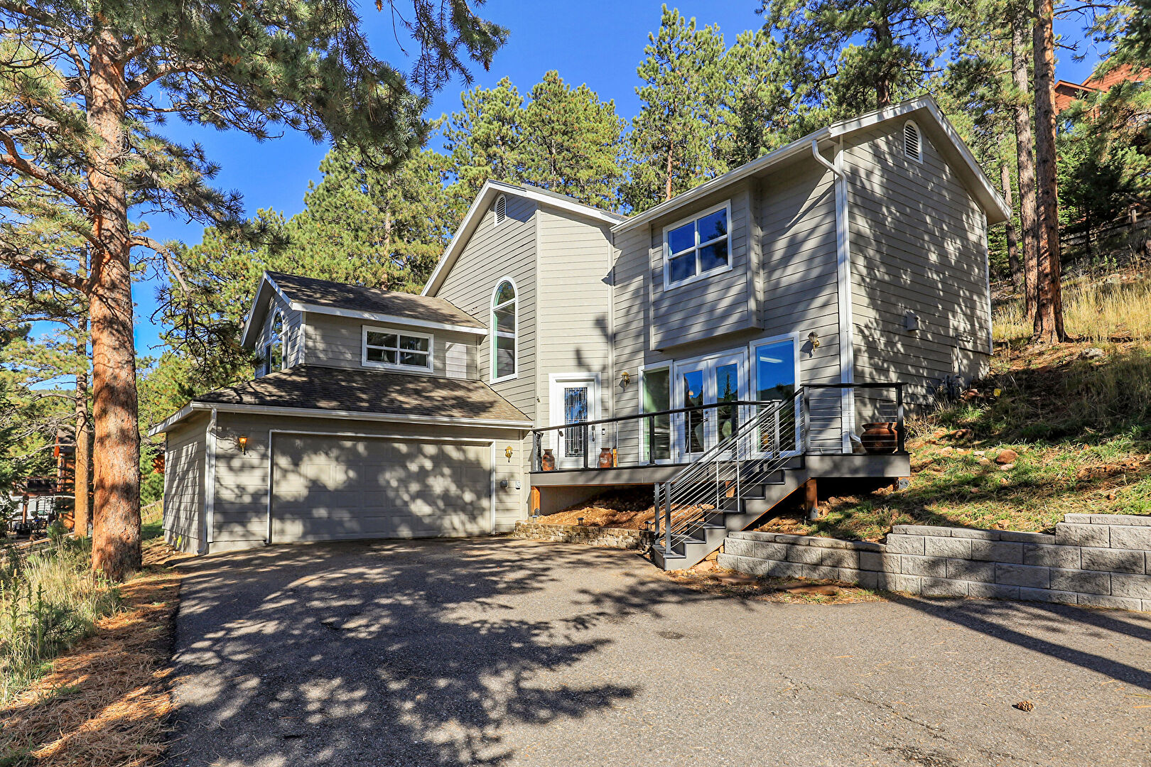 Front at 32857 Little Cub Road, Evergreen, CO 80439, listed by Pandora & John Erlandson, MLS ID: 1986509