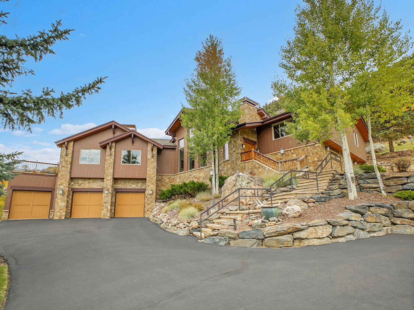 Front at 127 Granite Way, Evergreen, CO 80439, listed by Carmen Elam