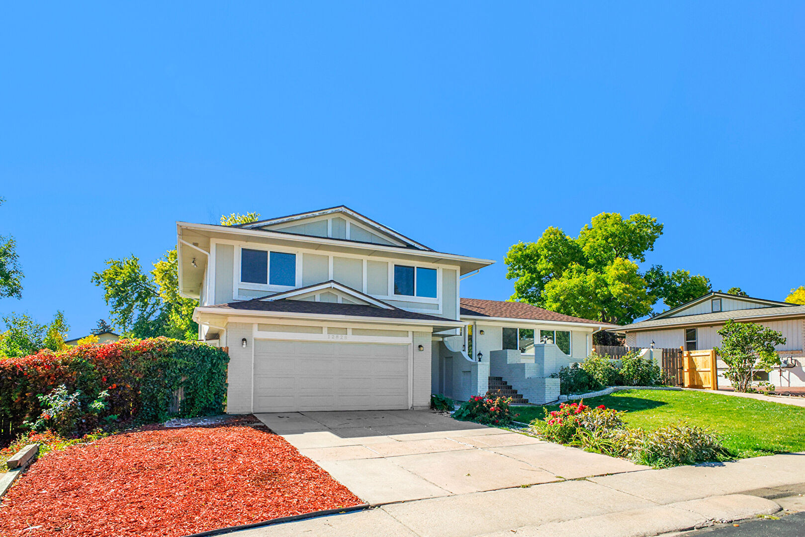 Front at 12828 W Adriatic Avenue, Lakewood, CO 80228, listed by Darren Blair, MLS ID: 5837227