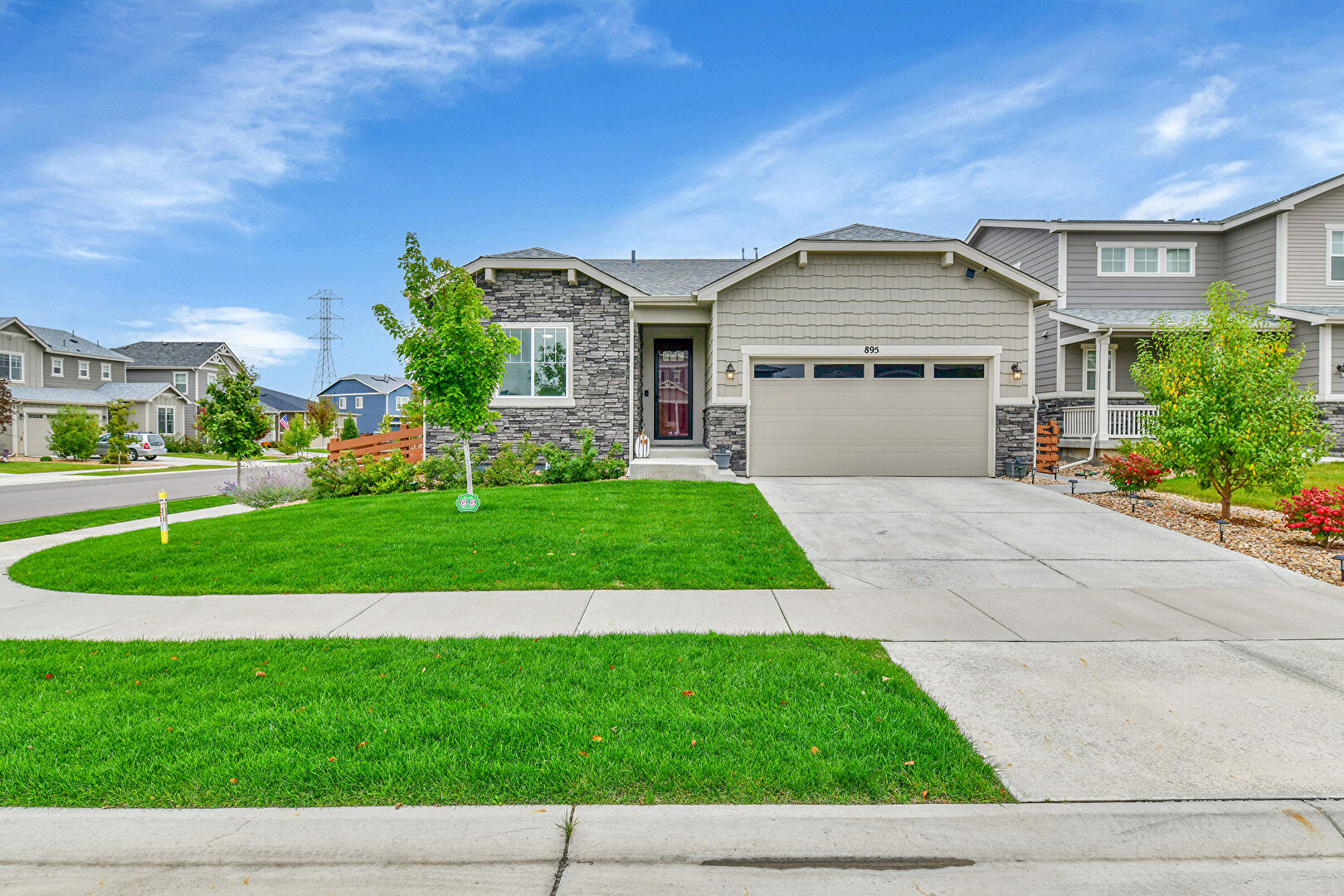 Front at 895 Golden Peak Drive, Erie, CO 80516, listed by David Geppert