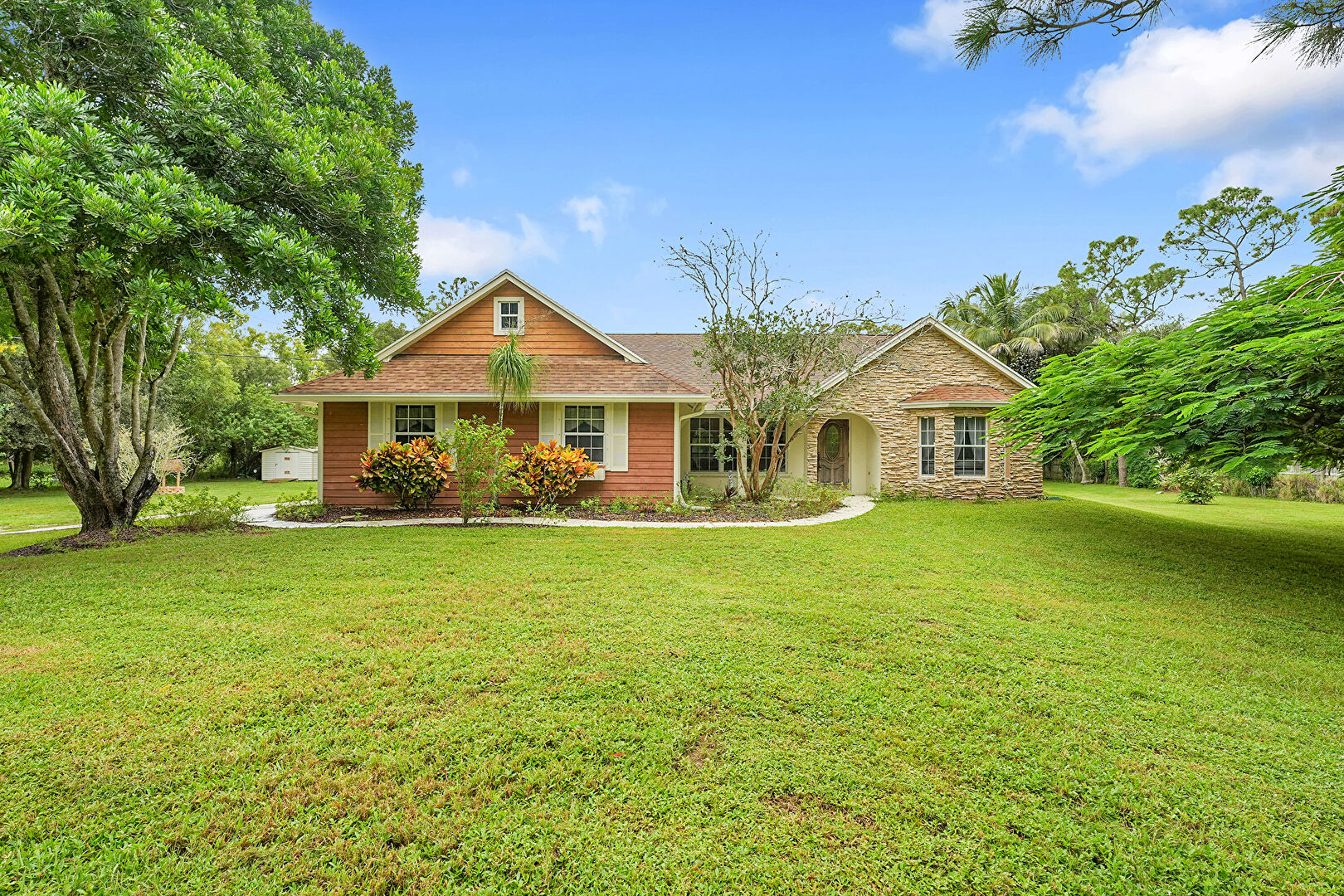 Front at 18392 48th Avenue North, The Acreage, FL 33470, listed by Nikki Hanna, MLS ID: F10530165
