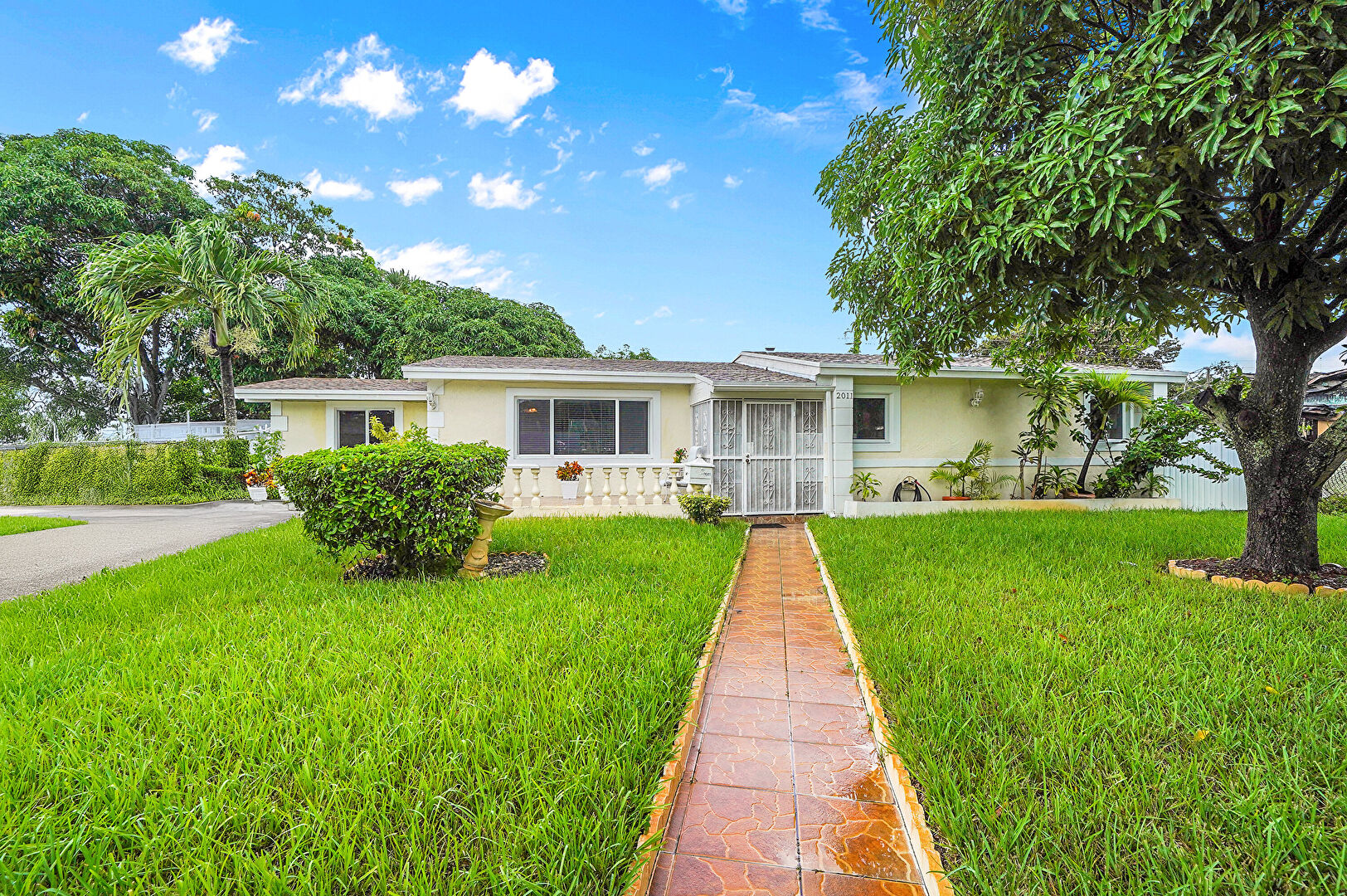 Front at 2011 Northwest 185th Terrace, Miami Gardens, FL 33056, listed by Maxwell Pierre