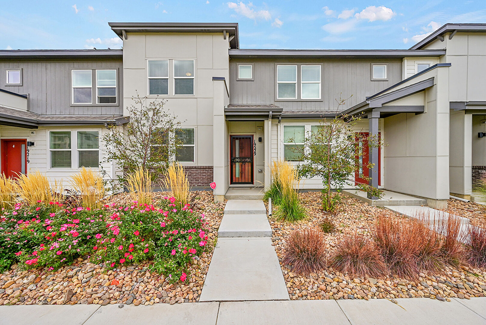 Front at 19229 East 64th Avenue, Denver, CO 80249, listed by Taylor Haas