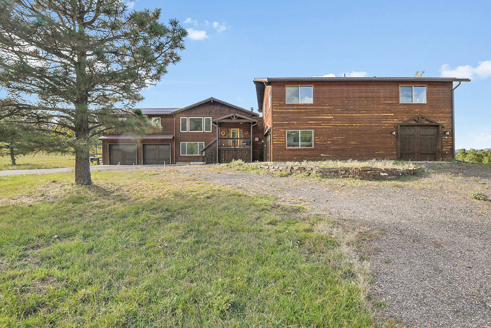 Front at 9174 South Armadillo Trail, ADU, Evergreen, CO 80439, listed by Sandra Bosworth
