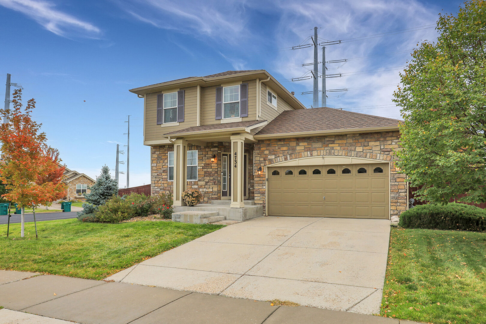 Front at 4734 South Duquesne Street, Aurora, CO 80016, listed by Kim Powelson