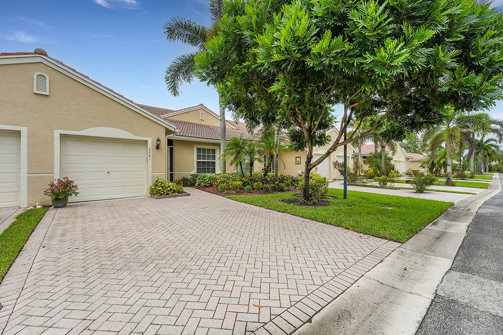 Front at 2041 Stonington Terrace, West Palm Beach, FL 33411, listed by Maddilise Lopez