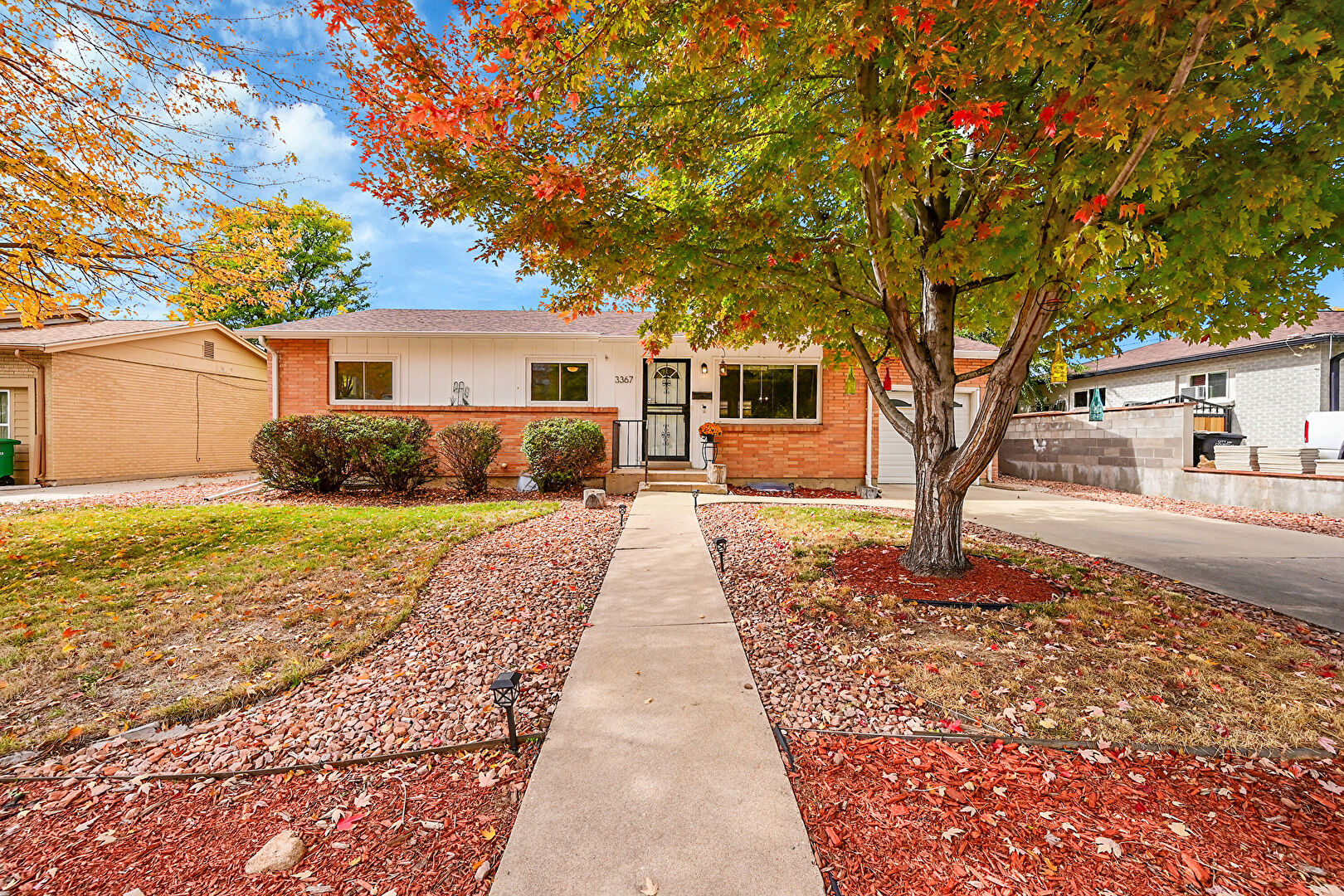 Front at 3367 S Stuart Street, Denver, CO 80236, listed by Jane Pearson