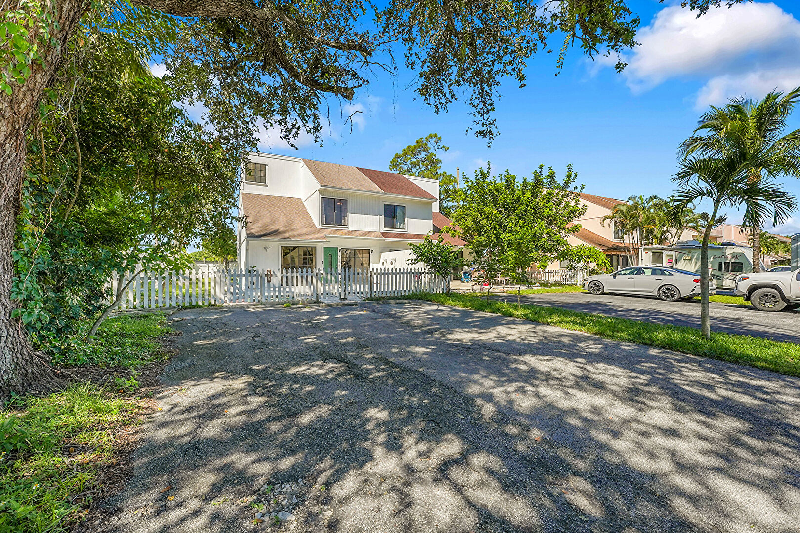 Front at 9056 Green Meadows Way, Palm Beach Gardens, FL 33418, listed by Leigh Smith- Tourino