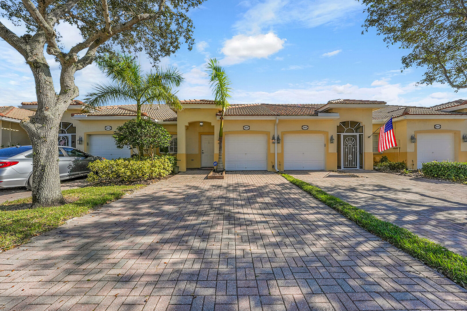Front at 9815 Galleon Drive, West Palm Beach, FL 33411, listed by Rachael Barach