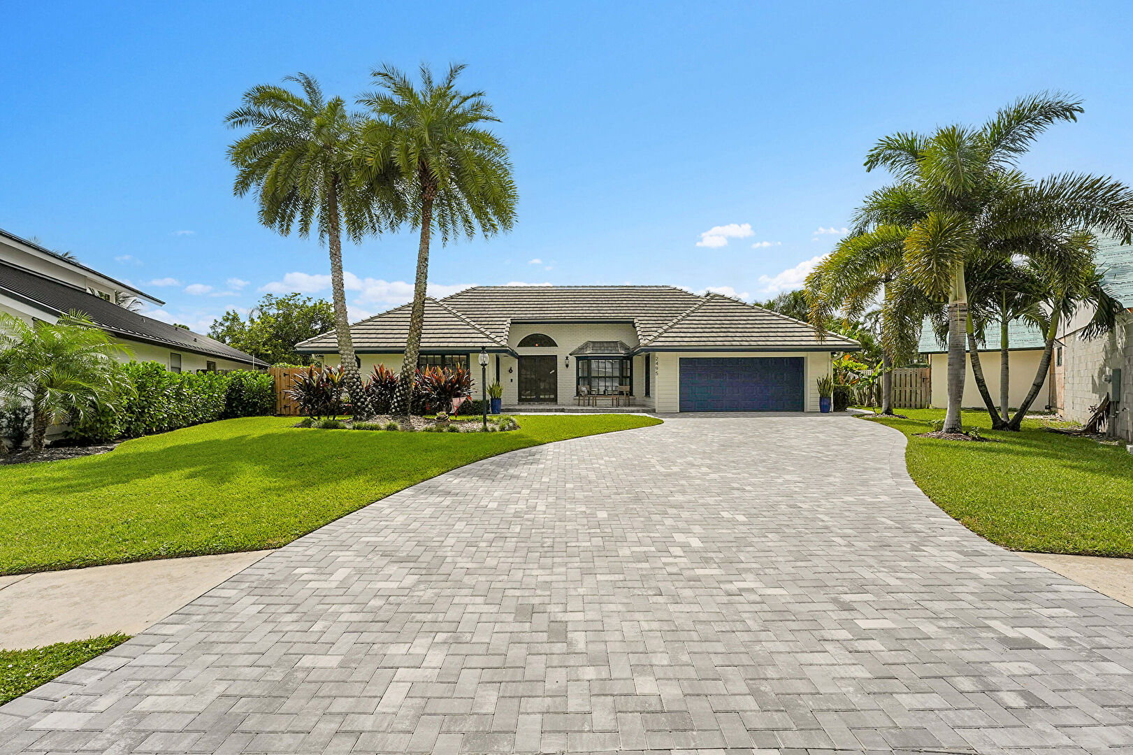 Front at 2495 Monaco Terrace, Palm Beach Gardens, FL 33410, listed by Chris Dyer