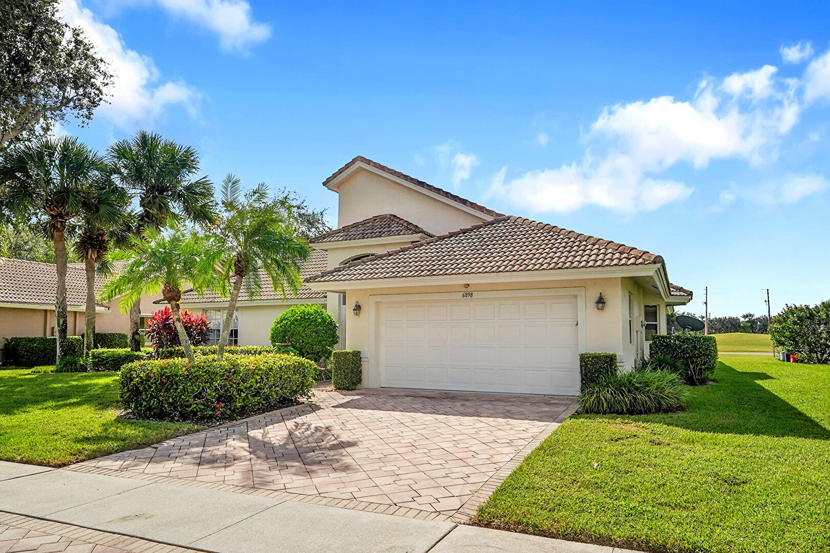 Front at 6898 Grenelefe Road, Boynton Beach, FL 33437, listed by Sue Susman