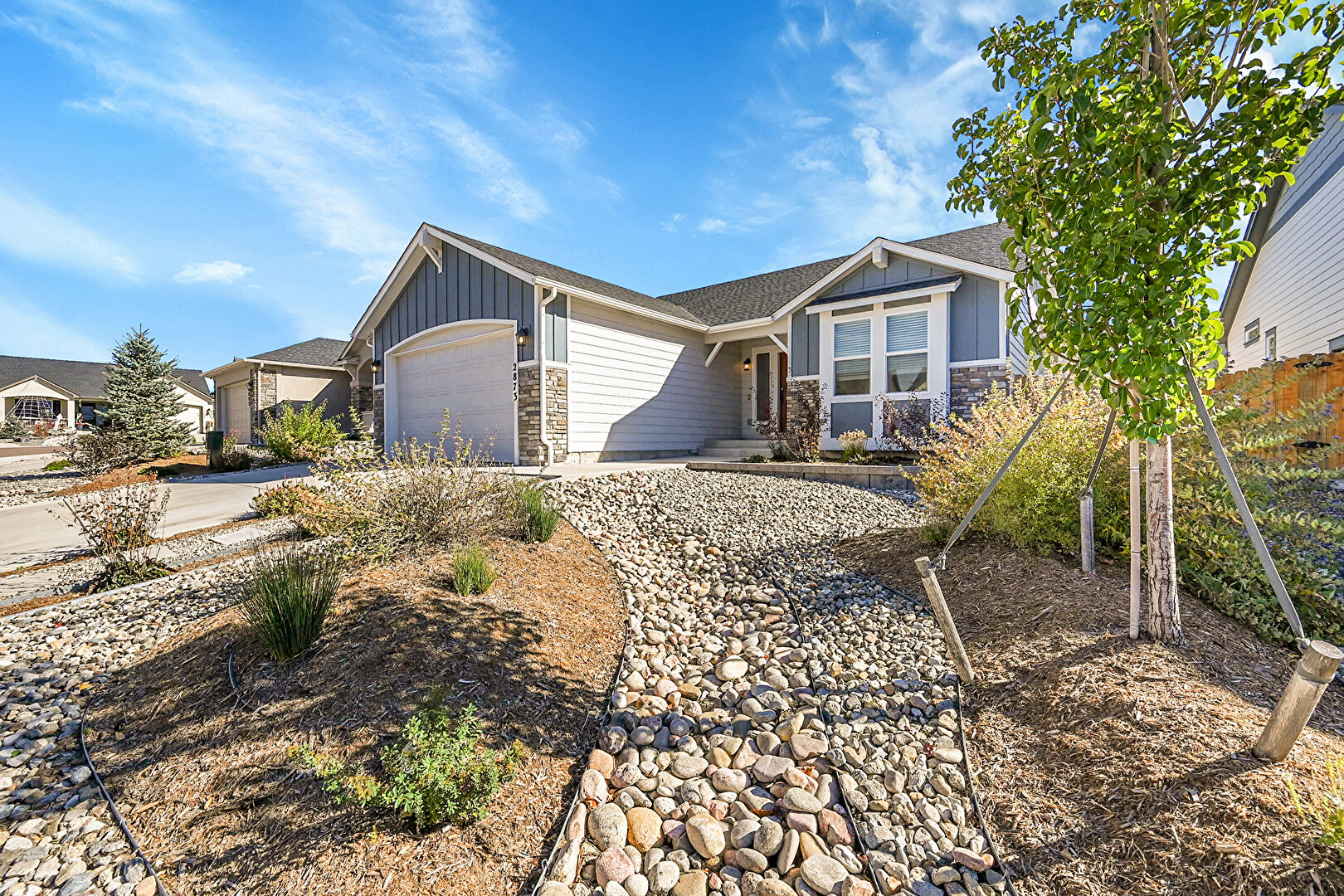 Front at 2873 Pony Club Lane, Colorado Springs, CO 80922, listed by Dan Breitfelder