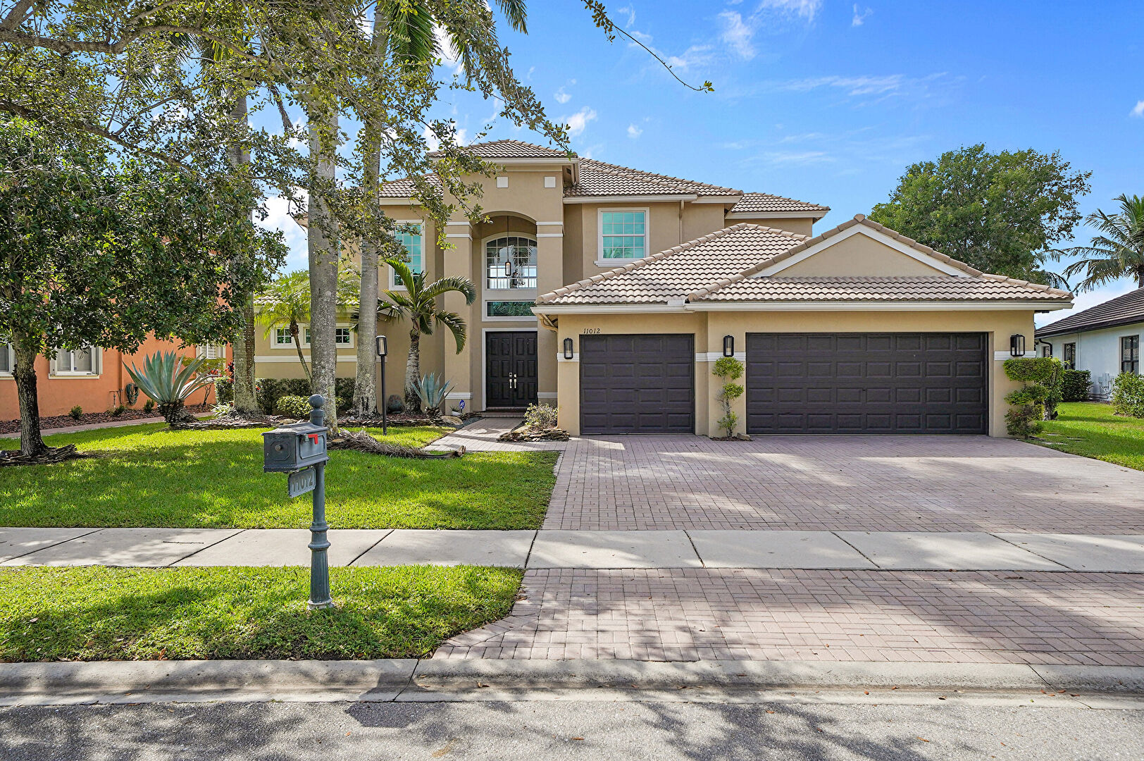 Front at 11012 Northwest 70th Court, Parkland, FL 33076, listed by Taylor Haslam