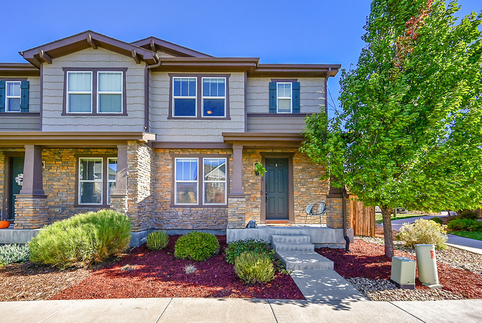 Front at 7599 South Zante Court, Aurora, CO 80016, listed by Debra Juel-Stevens