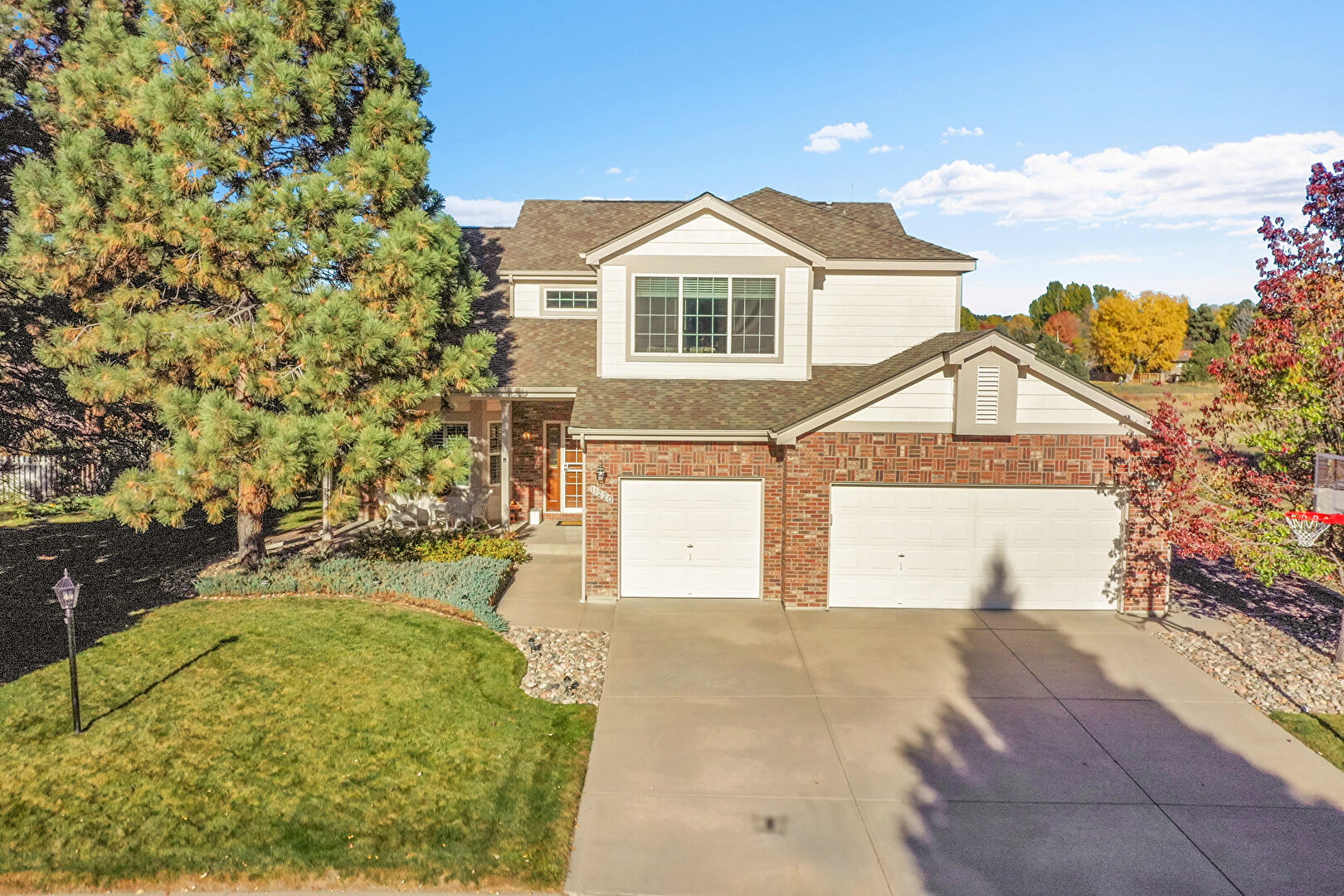 Front at 11220 Edinborough Way, Parker, CO 80138, listed by Victoria Merchant