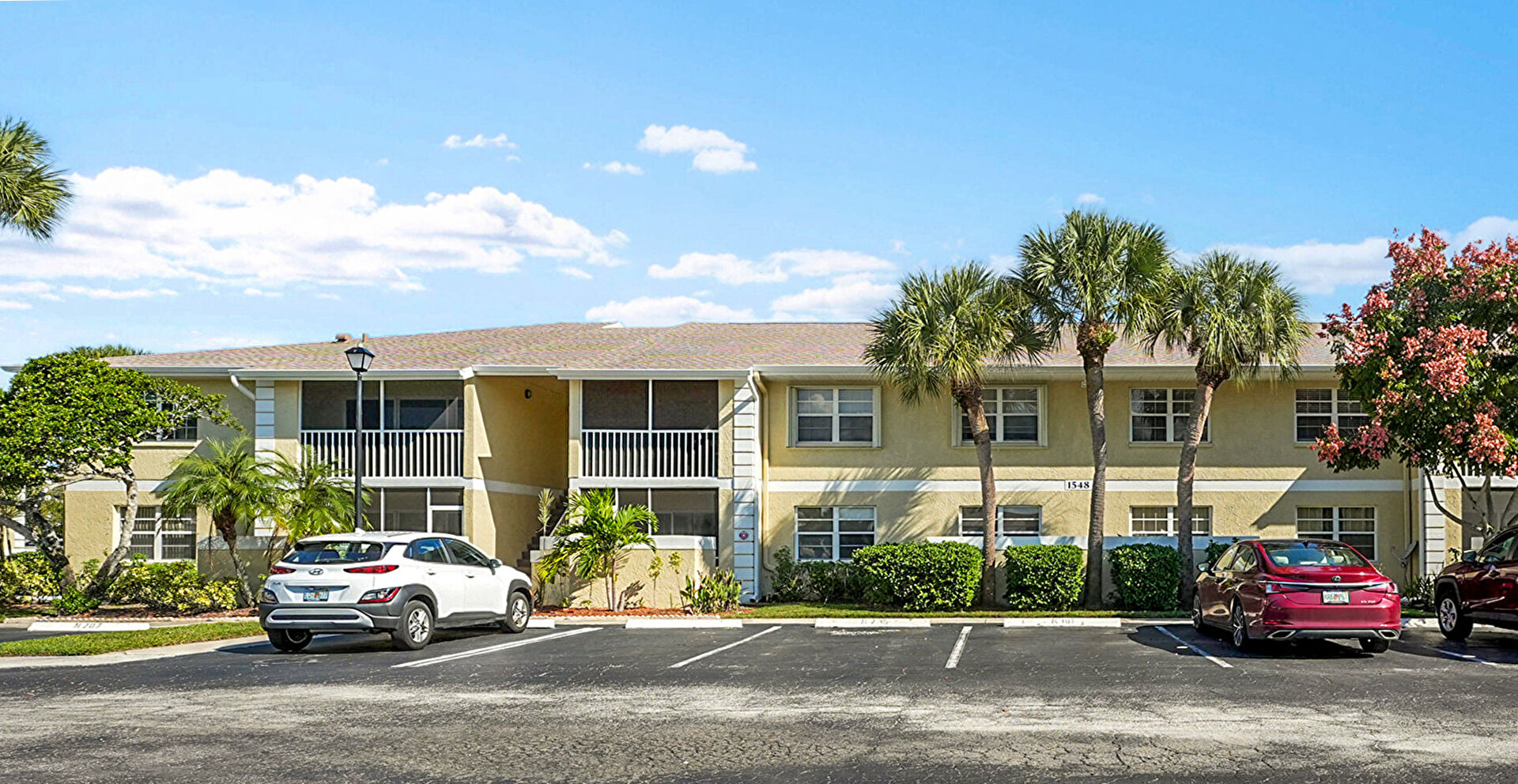 Front at 1548 Southeast Royal Green Circle, Building M, Unit 108, Port St. Lucie, FL 34952, listed by Margaret Good