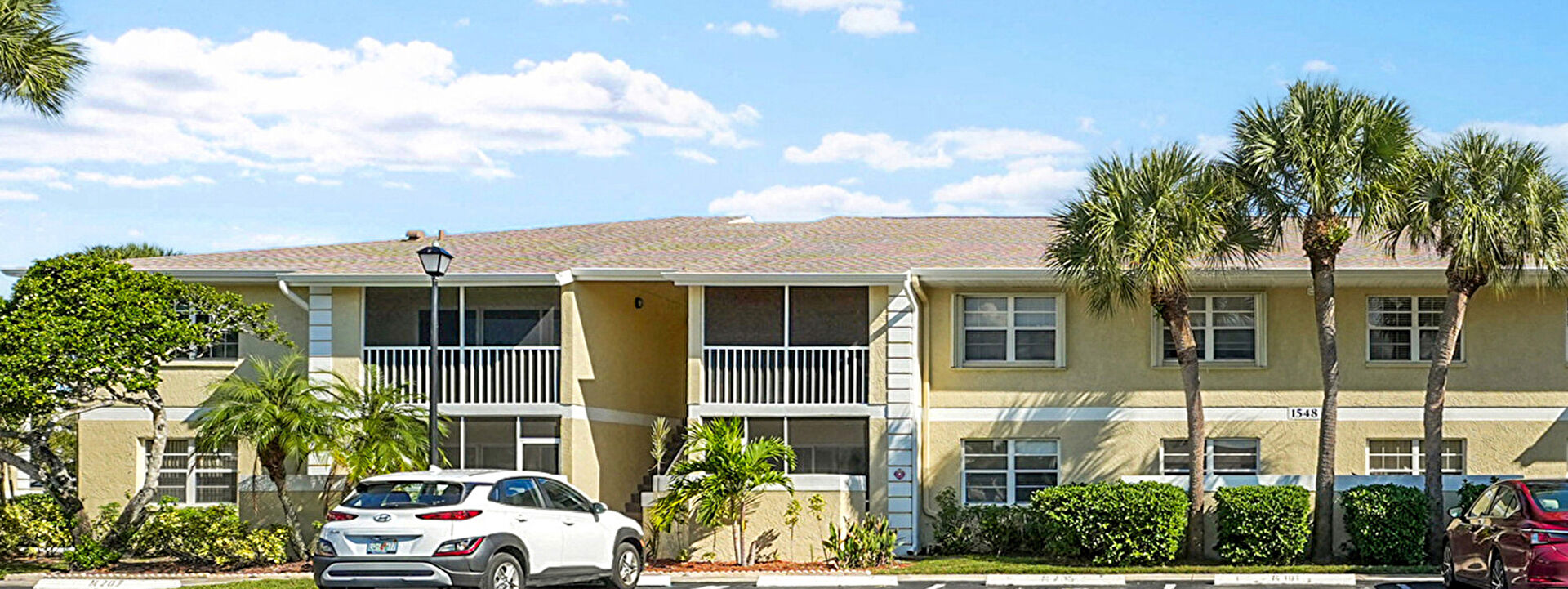 Front at 1548 Southeast Royal Green Circle, Building M, Unit 108, Port St. Lucie, FL 34952, listed by Margaret Good