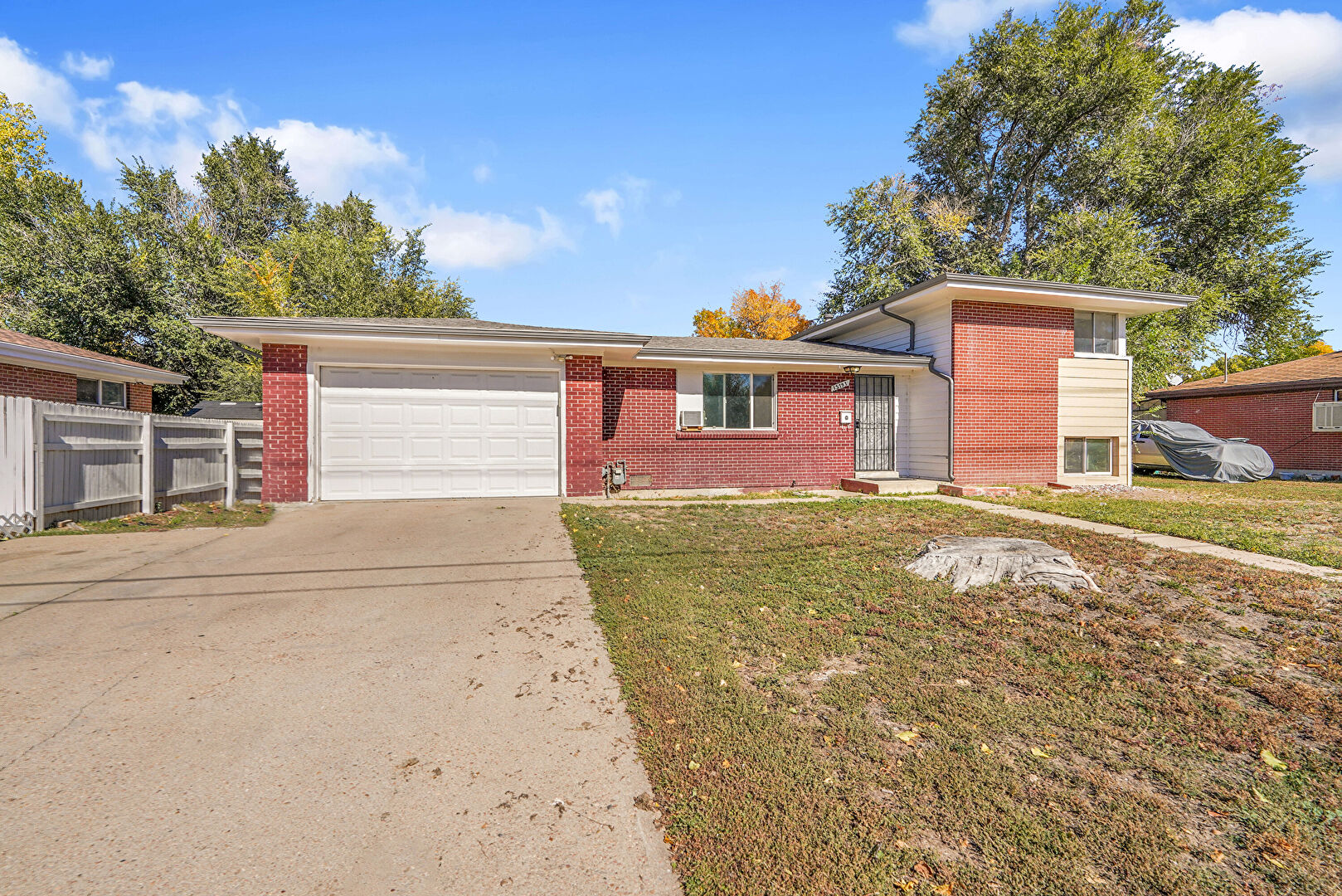 Front at 13791 E. 23rd Ave, Aurora, CO 80011, listed by Mariafe  McGregor