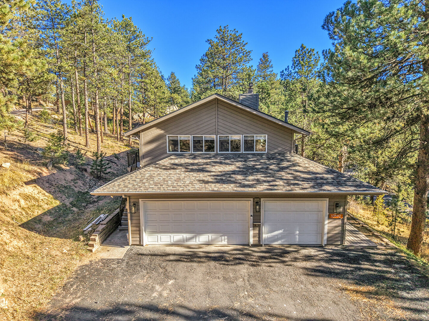 Front at 10342 Buena Vista Drive, Conifer, CO 80433, listed by Matt Bachus