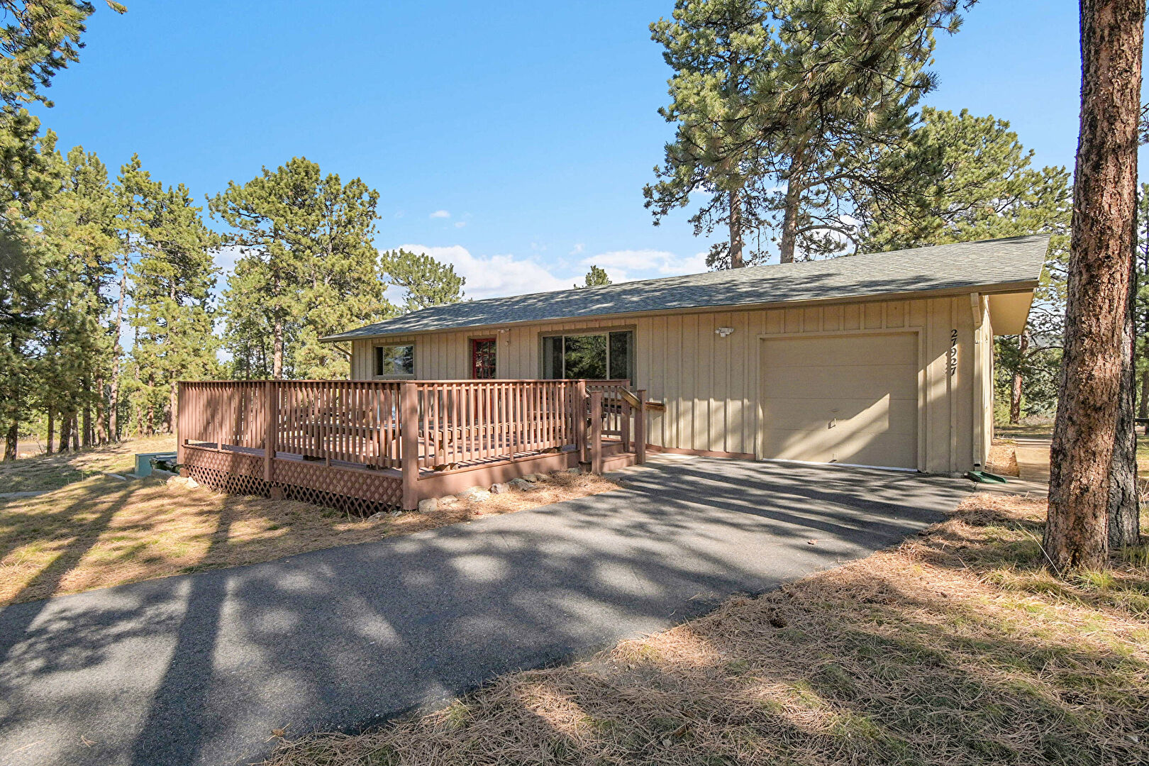 Front at 27927 Circle Drive, Evergreen, CO 80439, listed by Sandra Bosworth