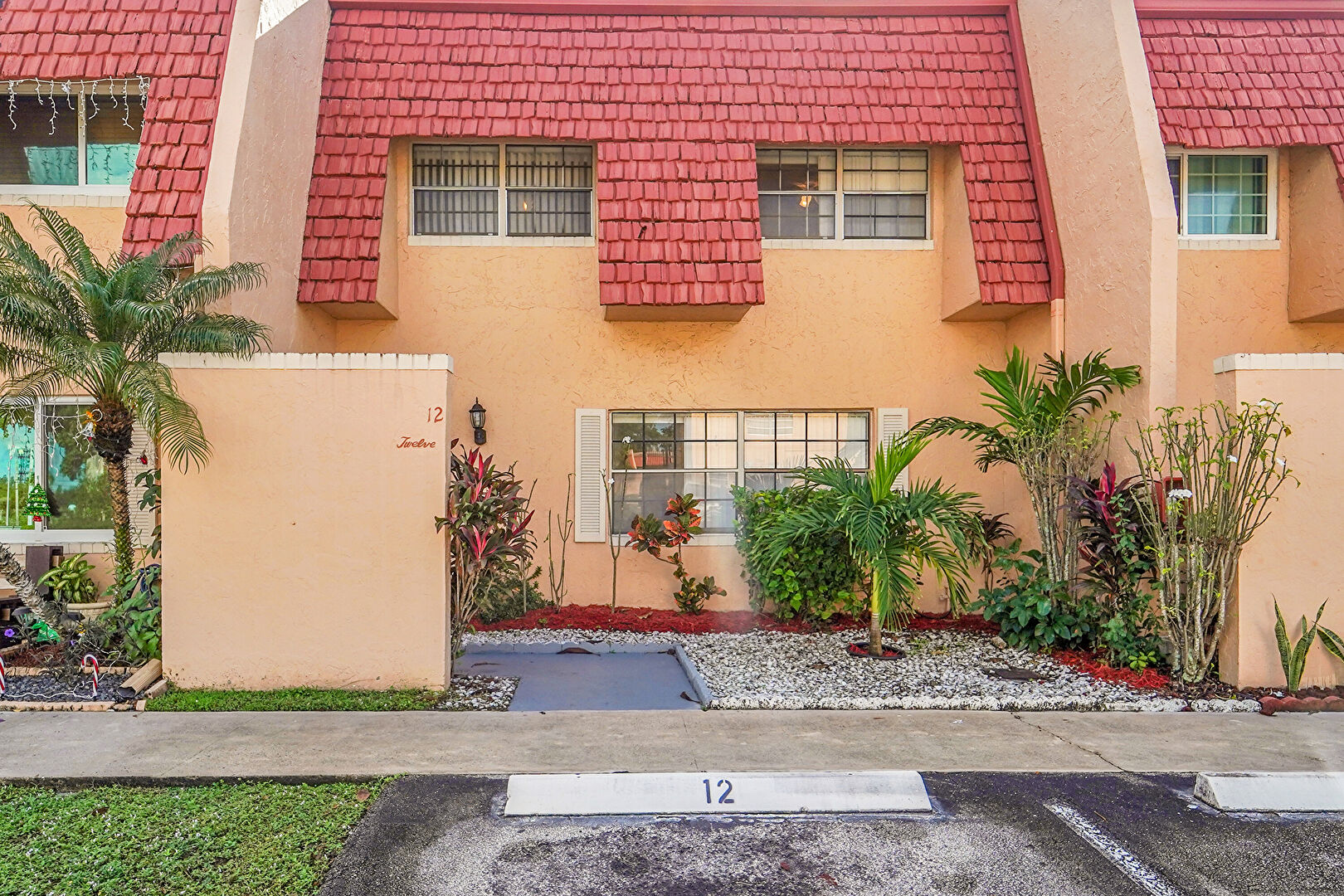 Exterior Entry at 12 Meacham Ln, Tamarac, FL 33319, listed by Alejandro Cuartas, MLS ID: F10540178