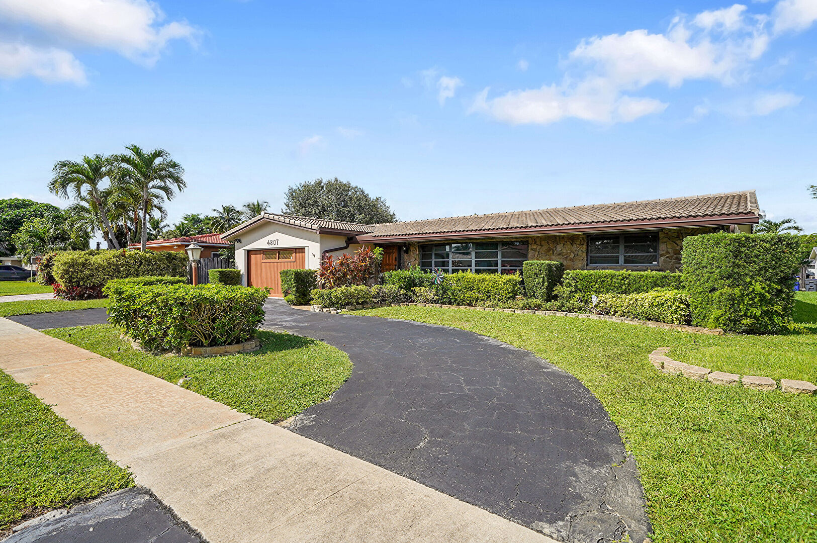 Front at 4807 Cleveland Street, Hollywood, FL 33021, listed by Barbara Marks