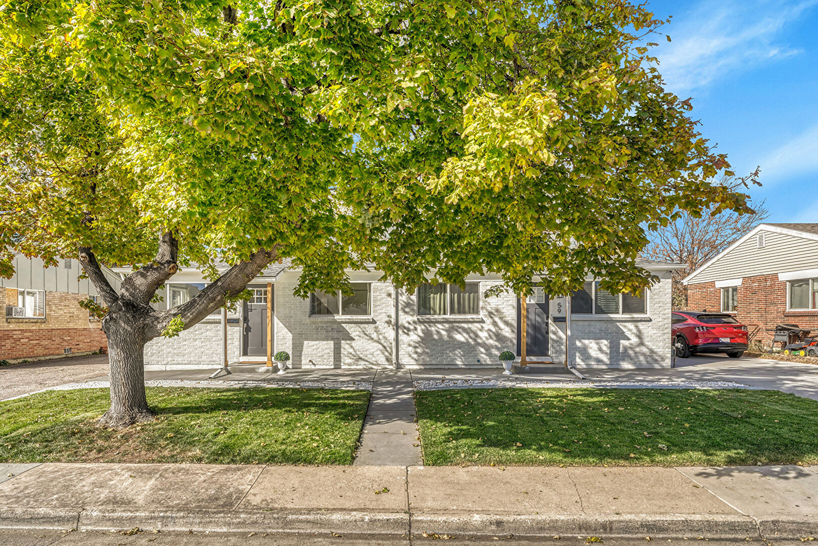 Front at 57 Del Mar Circle, Aurora, CO 80011, listed by Donovan Olson