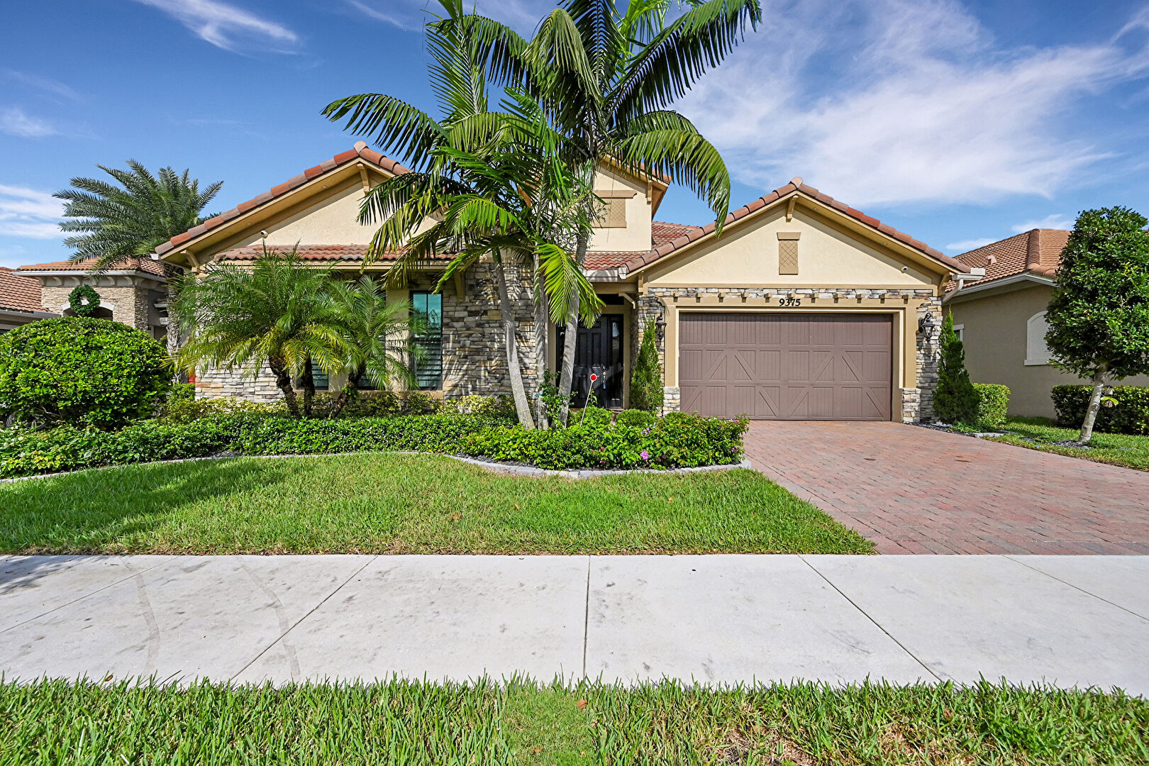 Front at 9375 Cantal Circle West, Parkland, FL 33076, listed by Nur (Rudy) Daya