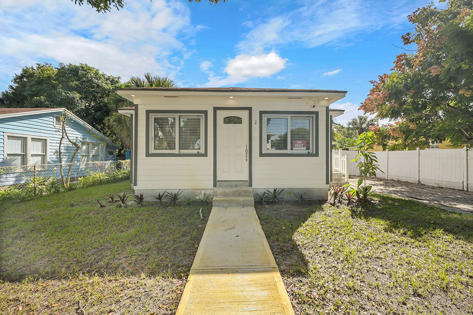 Front yard at 422 49th Street, West Palm Beach, FL 33407, listed by Michael Clemente