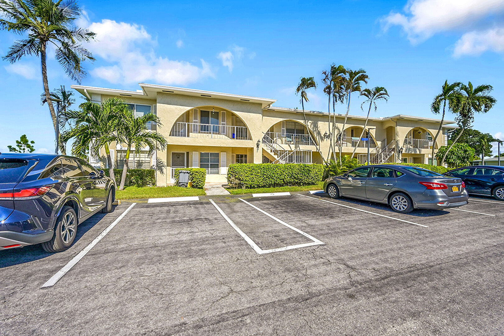 Front of Structure at 13777 Flora Place, Unit D, Delray Beach, FL 33484, listed by Frantz Python