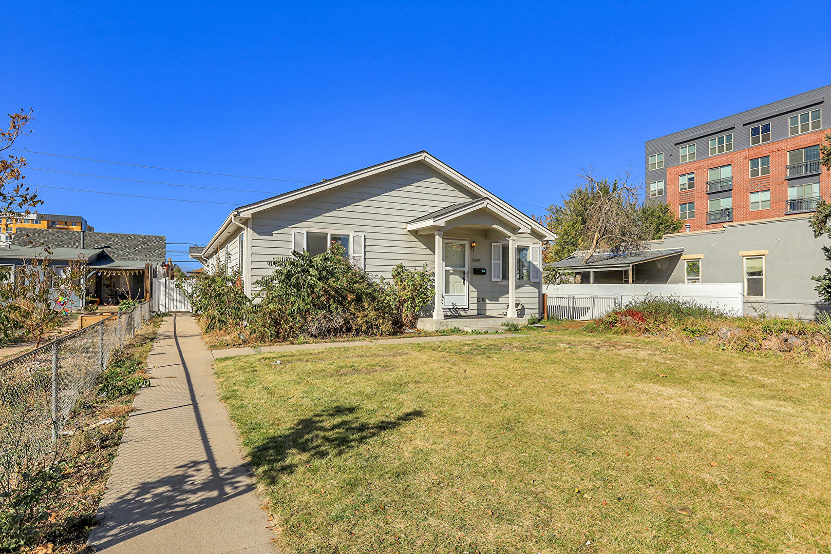 Front yard at 2009 South Acoma Street, Denver, CO 80223, listed by Taylor Haas