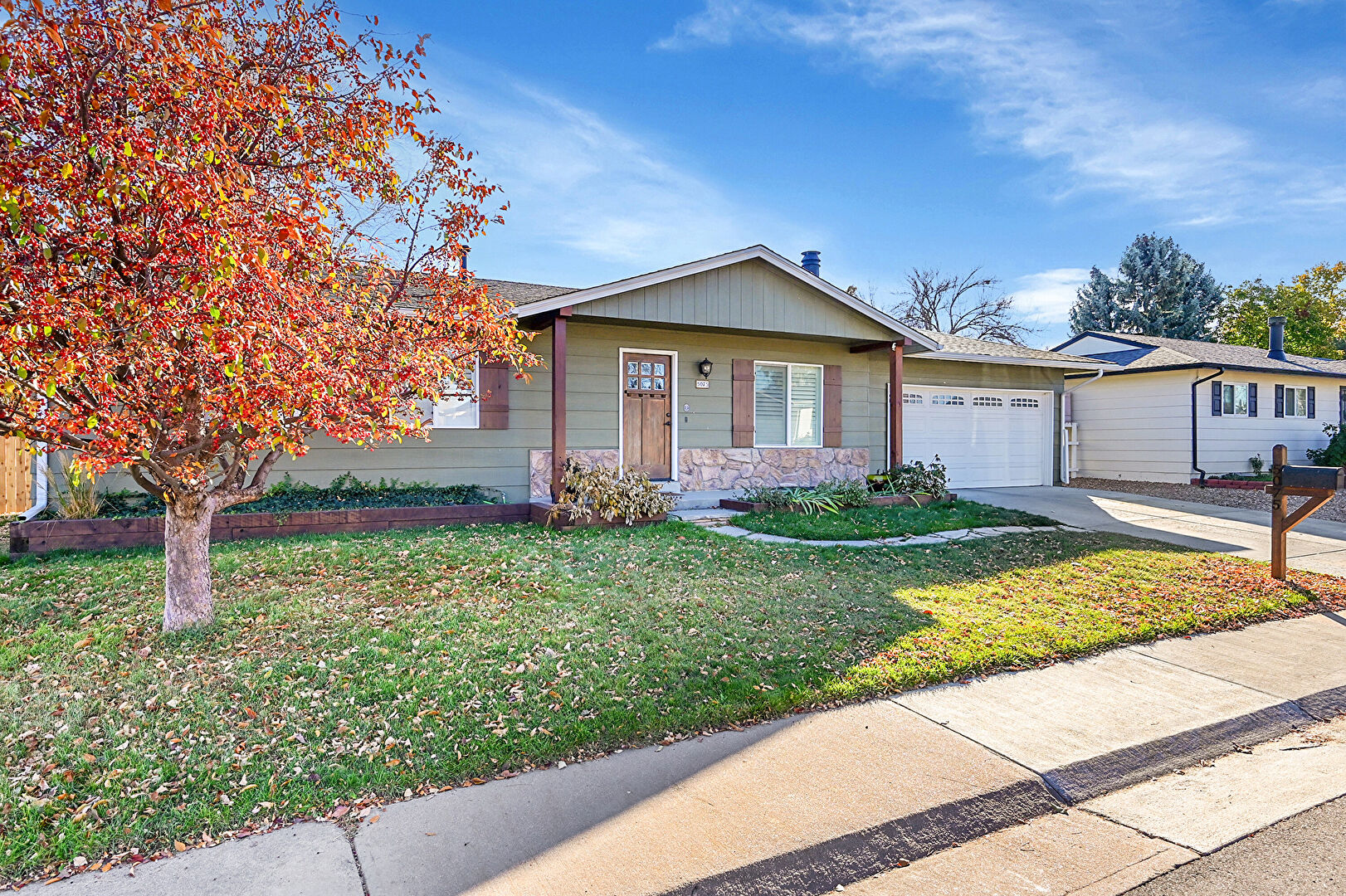 Front at 5075 East Weaver Avenue, Centennial, CO 80121, listed by Julie Leins