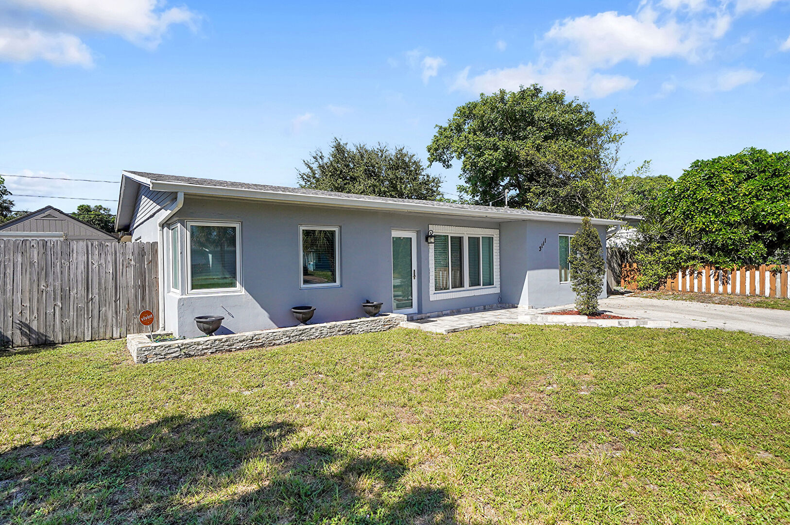 Front at 3111 Northeast 11th Terrace, Pompano Beach, FL 33064, listed by Amy Drinnon