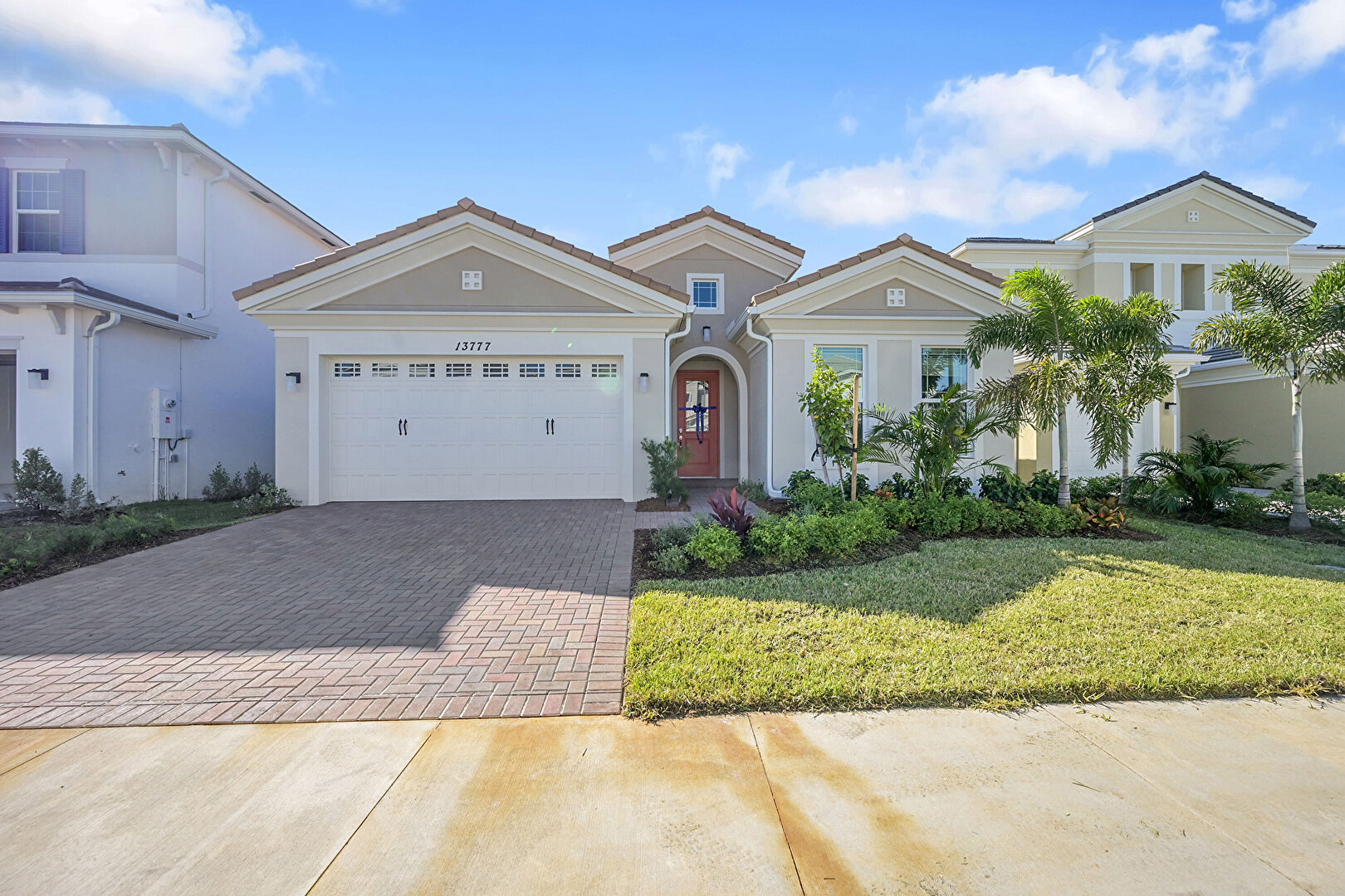 Front yard at 13777 Prickly Cone Cove, Westlake, FL 33411, listed by Mauricio Londono