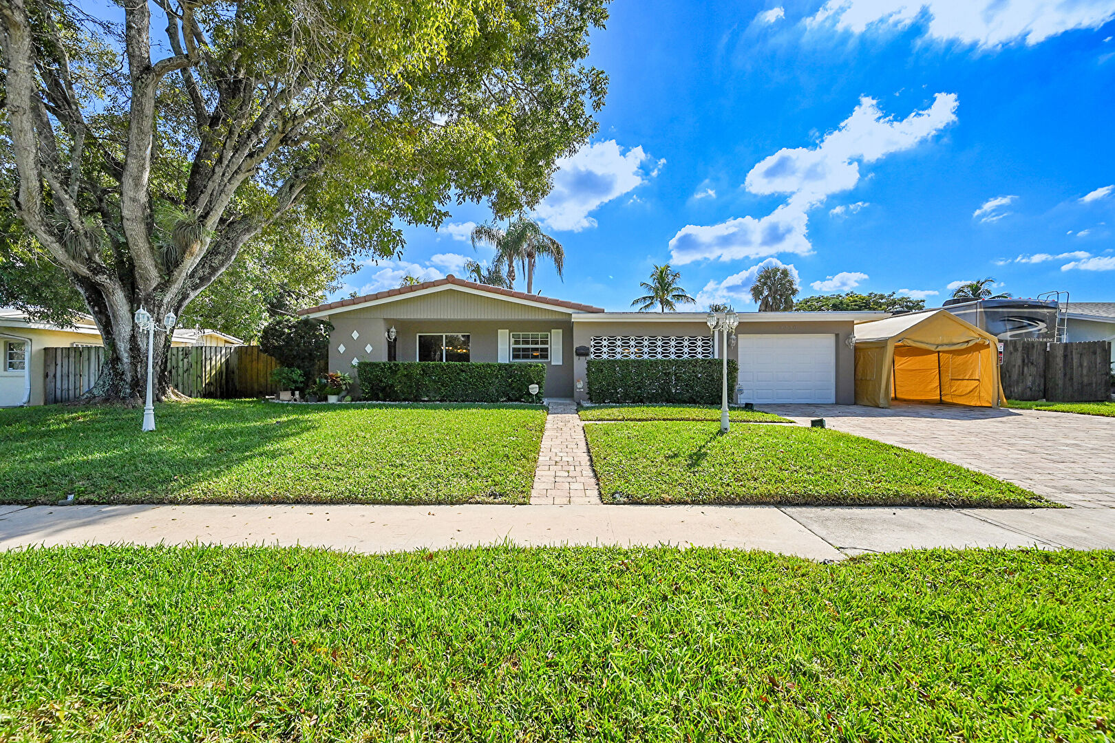 Front at 4230 Northwest 12th Street, Coconut Creek, FL 33066, listed by Charilee Rivera