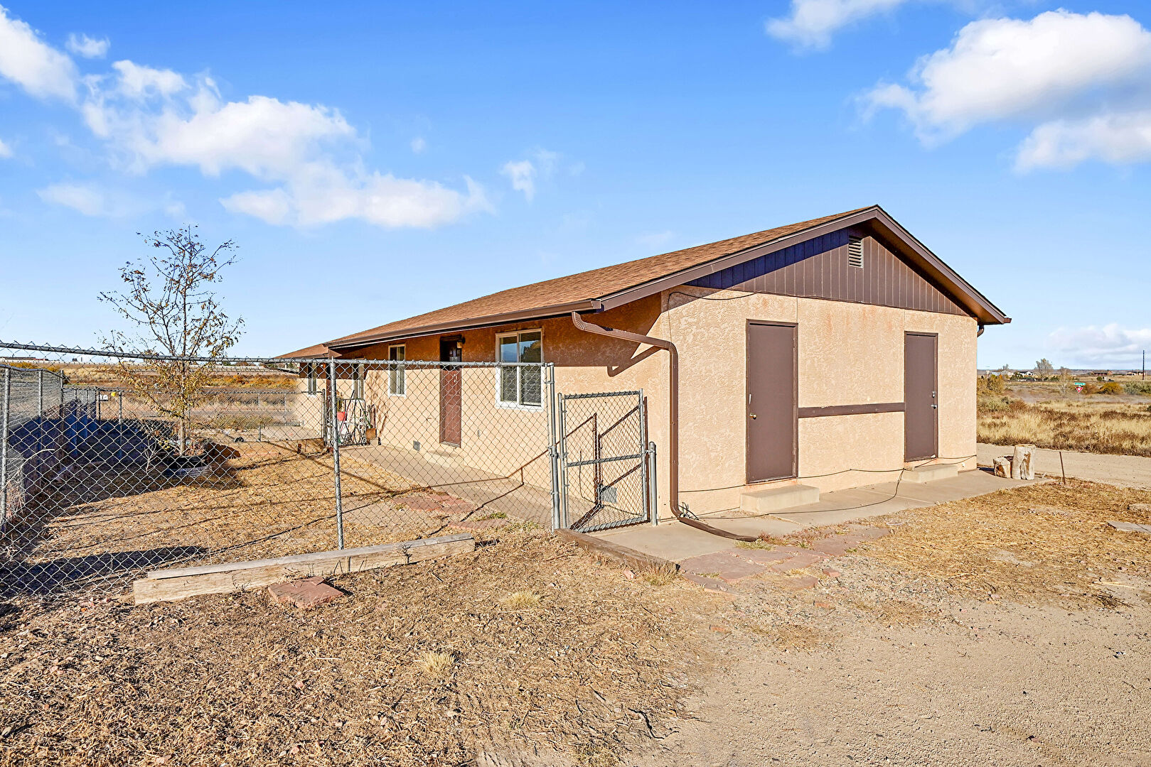 Front yard at 1066 East Mallon Drive, Pueblo, CO 81007, listed by Jayson Holland