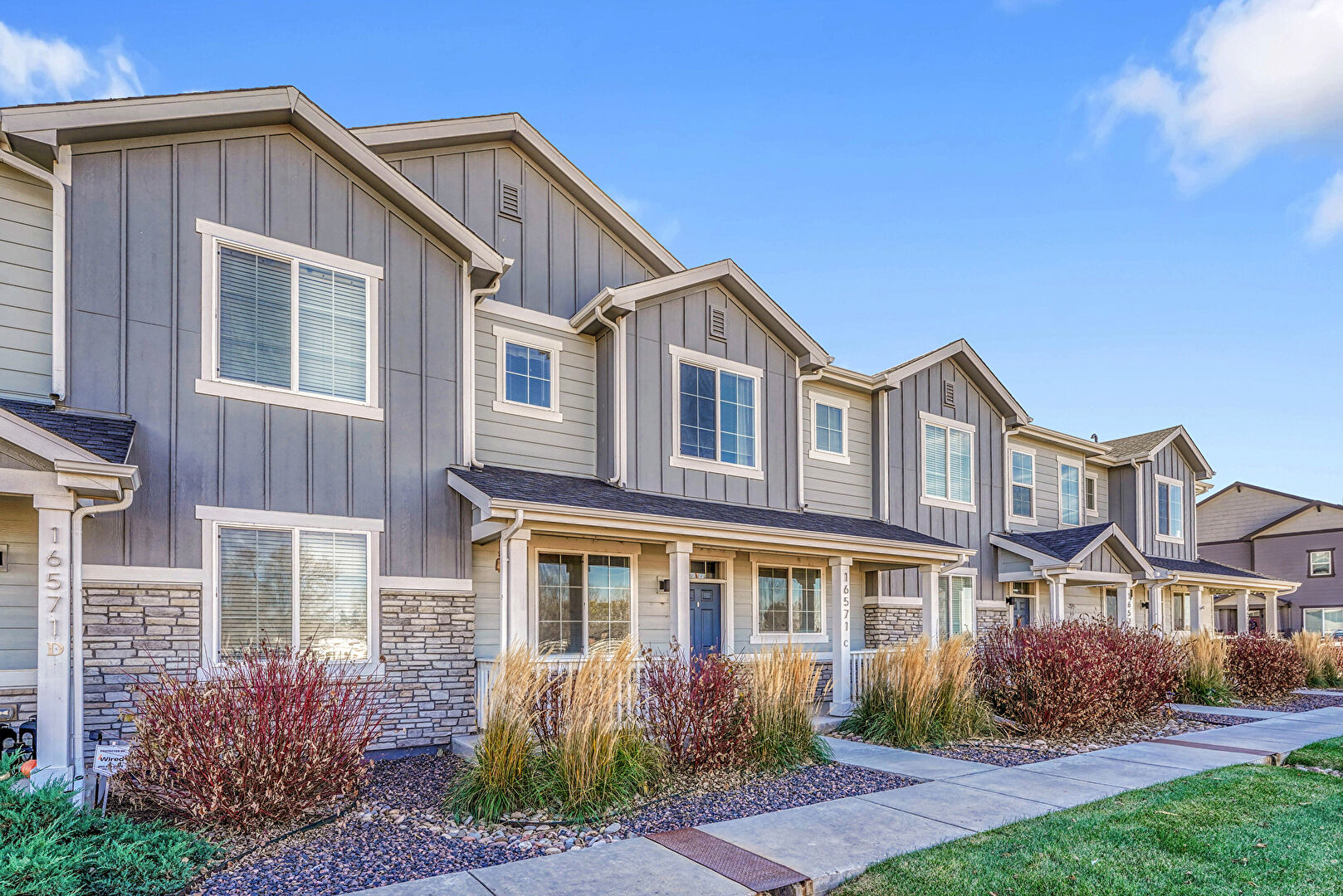 Front at 16571 East 119th Way, #C, Commerce City, CO 80022, listed by Jayson Holland