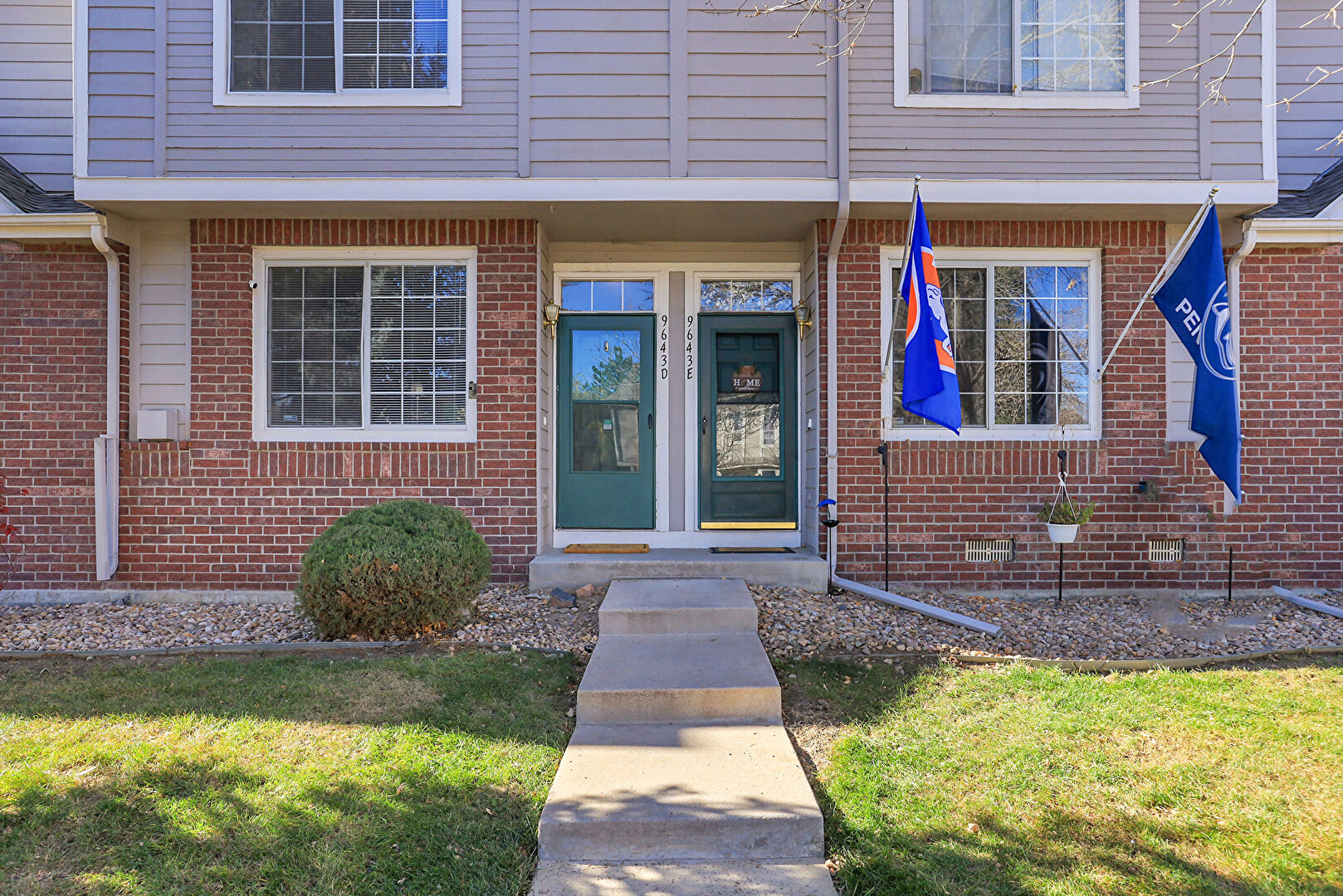 Front at 9643 West Chatfield Avenue unit D, Littleton, CO 80128, listed by Laurie Stoessel