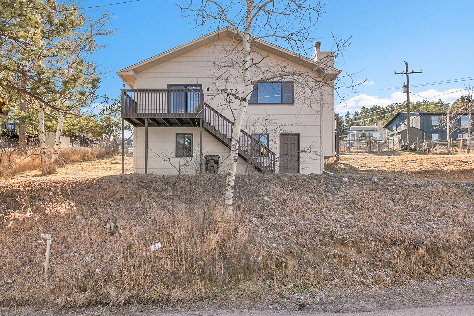 Back at 26172 Center Drive, Evergreen, CO 80439, listed by Sandra Bosworth